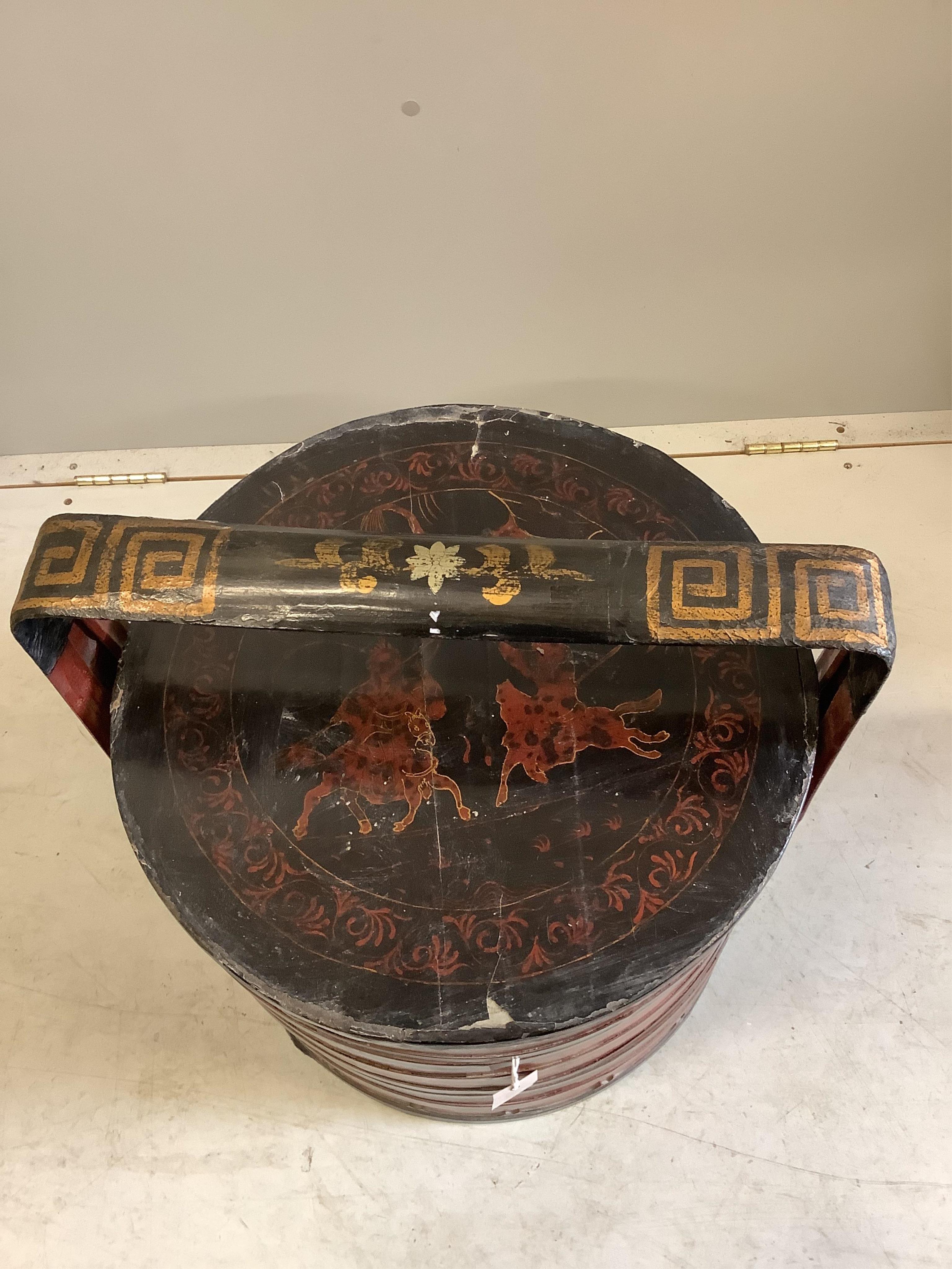 A Chinese lacquer circular sectional box, diameter 49cm, height 53cm. Condition - poor to fair